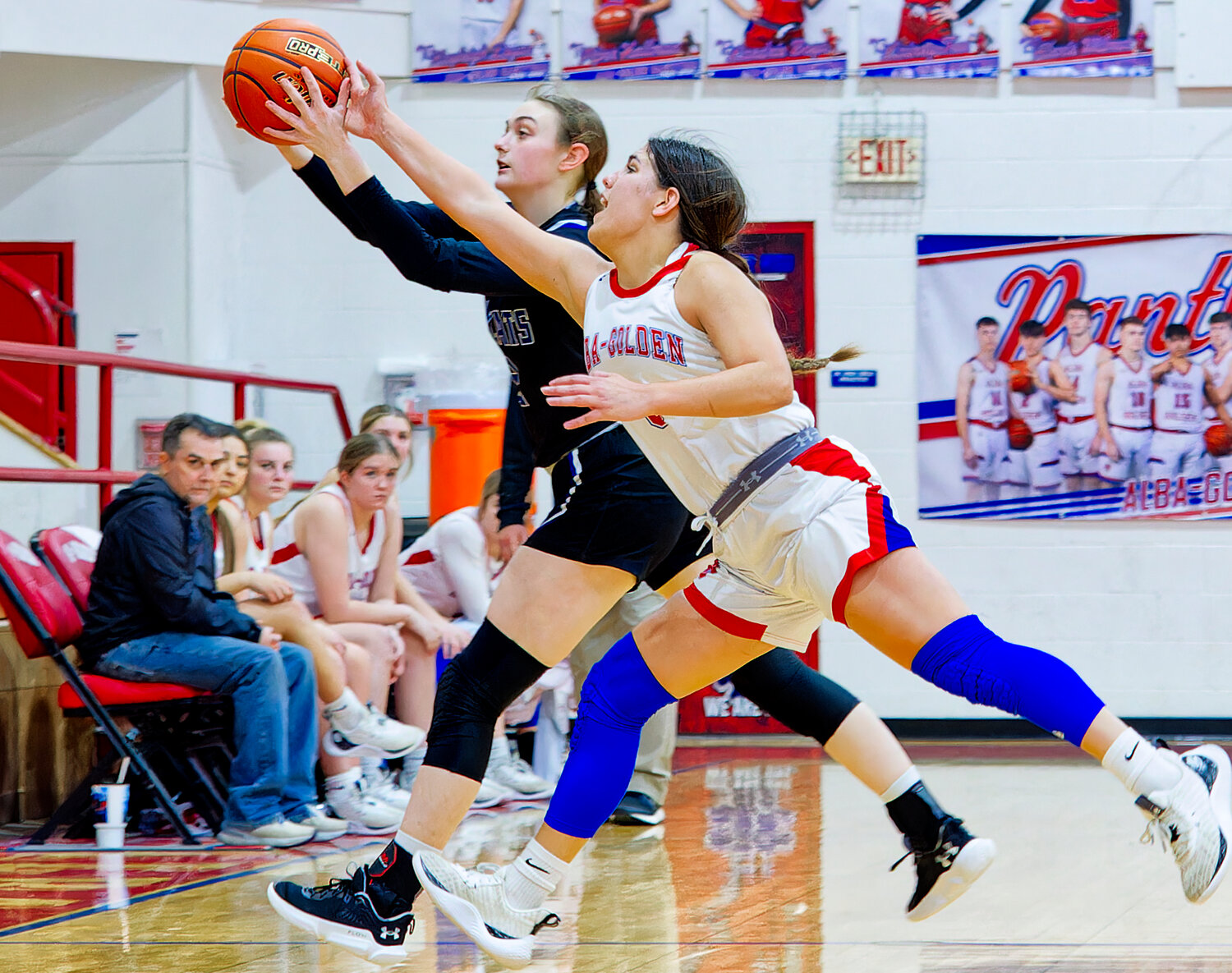 Erin Langston defends for Alba-Golden against Fruitvale Friday. The 86-30 win kept the Lady Panthers unbeaten in district play, coupled with last Tuesday’s 54-20 win over Cumby. The final two games are Friday at North Hopkins and next Tuesday hosting Cooper.